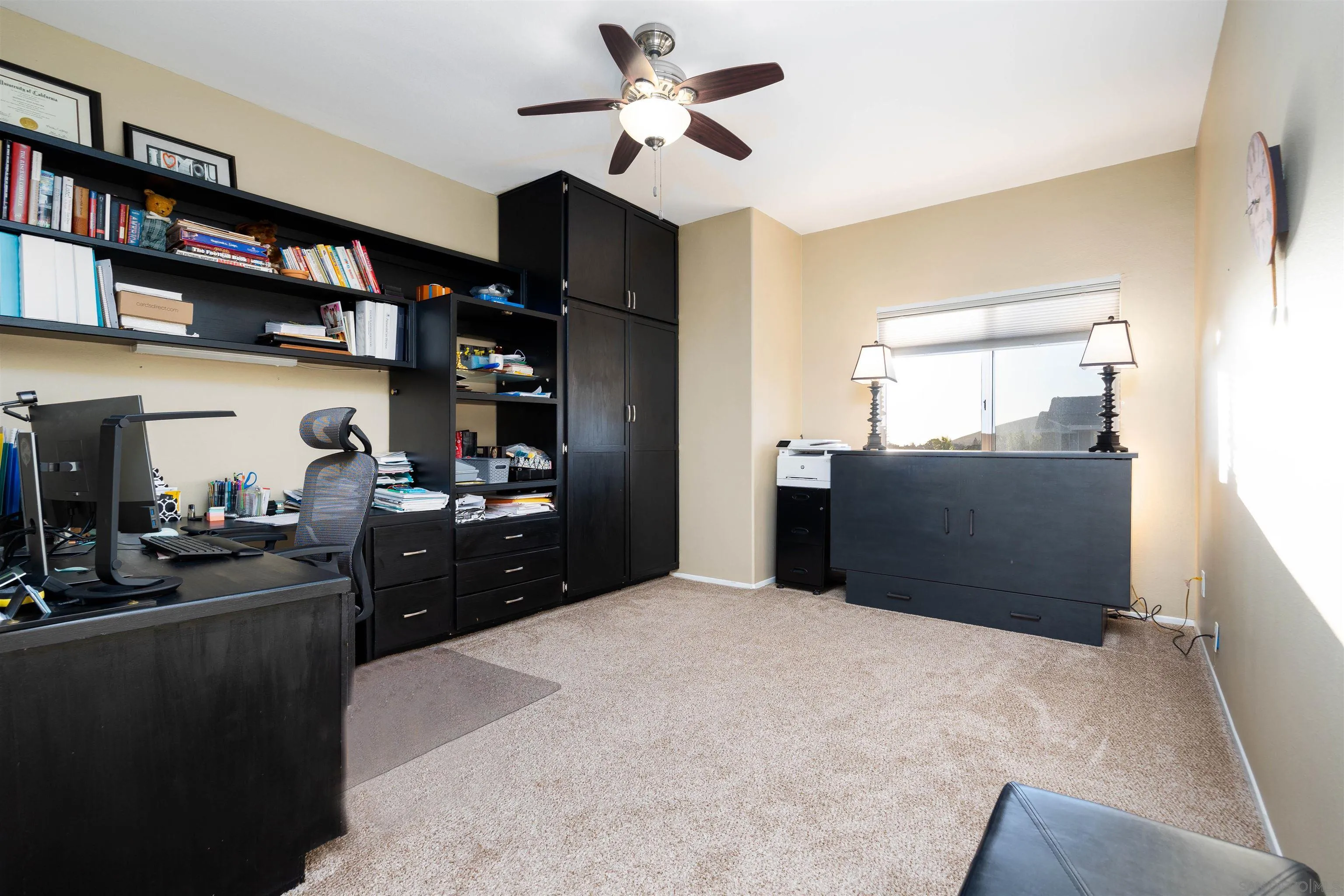 13835 Carmel Ridge Road San Diego, CA 92128 - Photo 23 of 38 a kitchen with stainless steel appliances granite countertop a refrigerator and a stove top oven