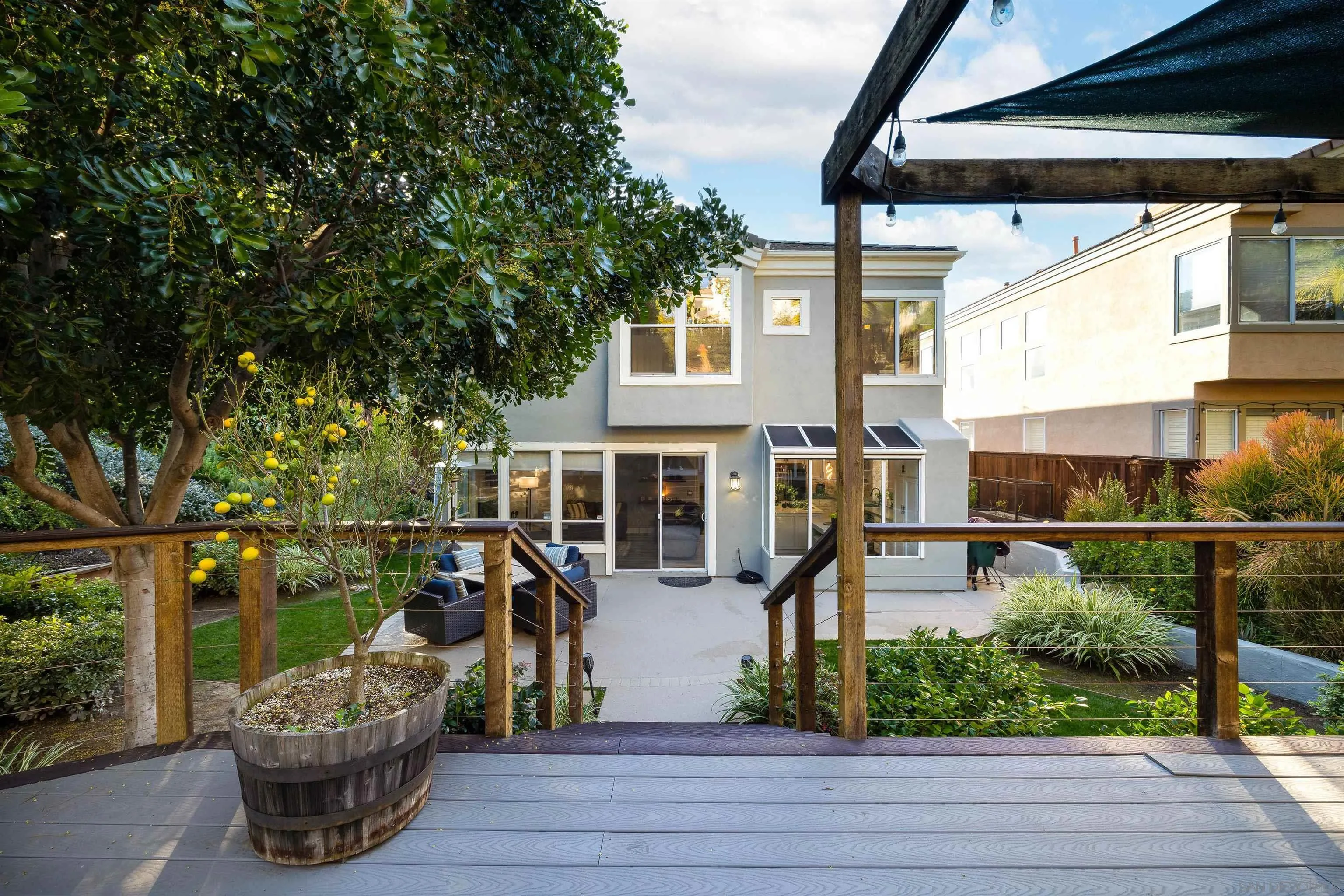 13835 Carmel Ridge Road San Diego, CA 92128 - Photo 25 of 38 a view of a chairs and table in the patio