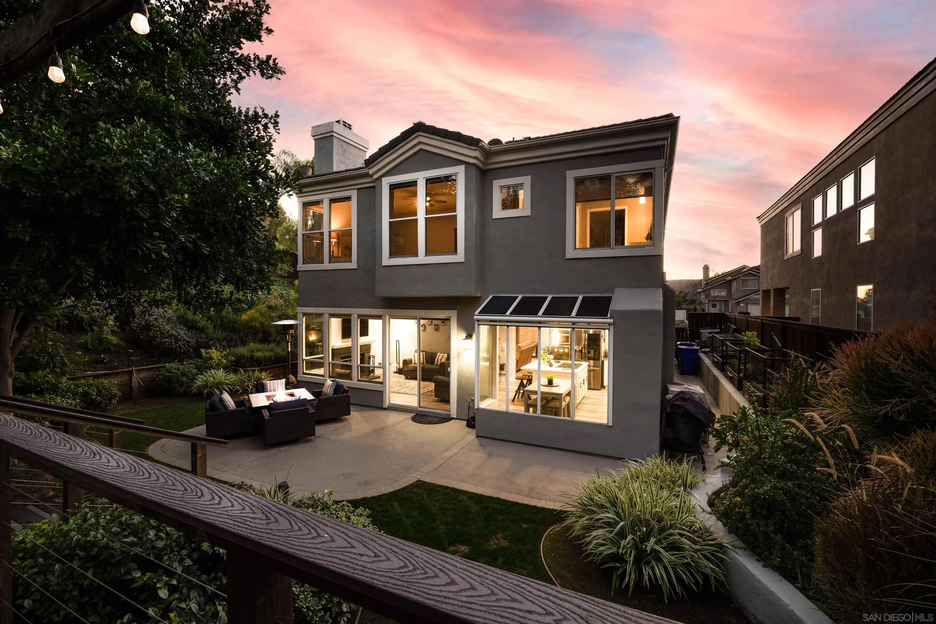 13835 Carmel Ridge Road San Diego, CA 92128 - Photo 28 of 38 a front view of a house with a yard