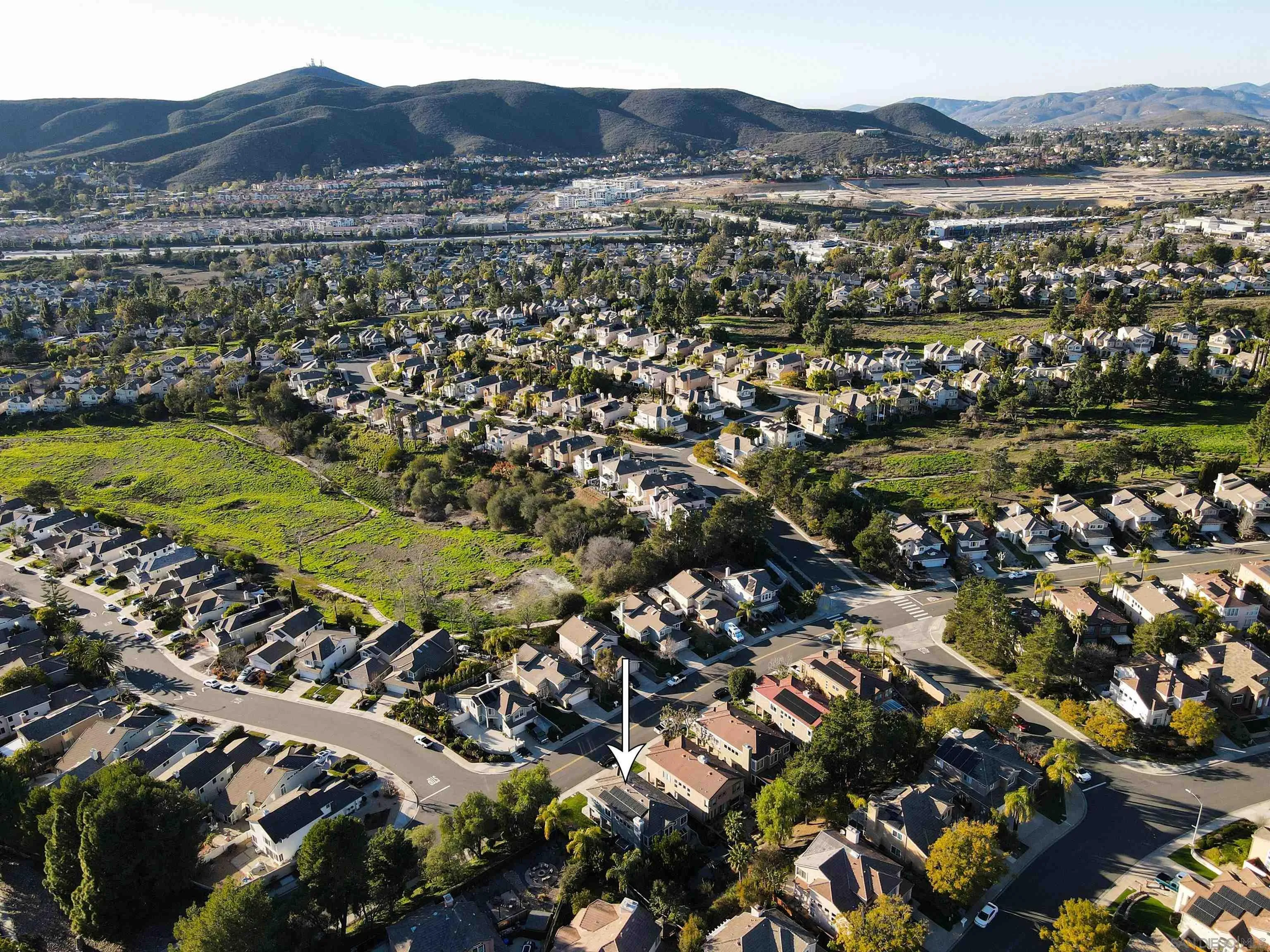 13835 Carmel Ridge Road San Diego, CA 92128 - Photo 35 of 38 a view of a city with mountains in the background