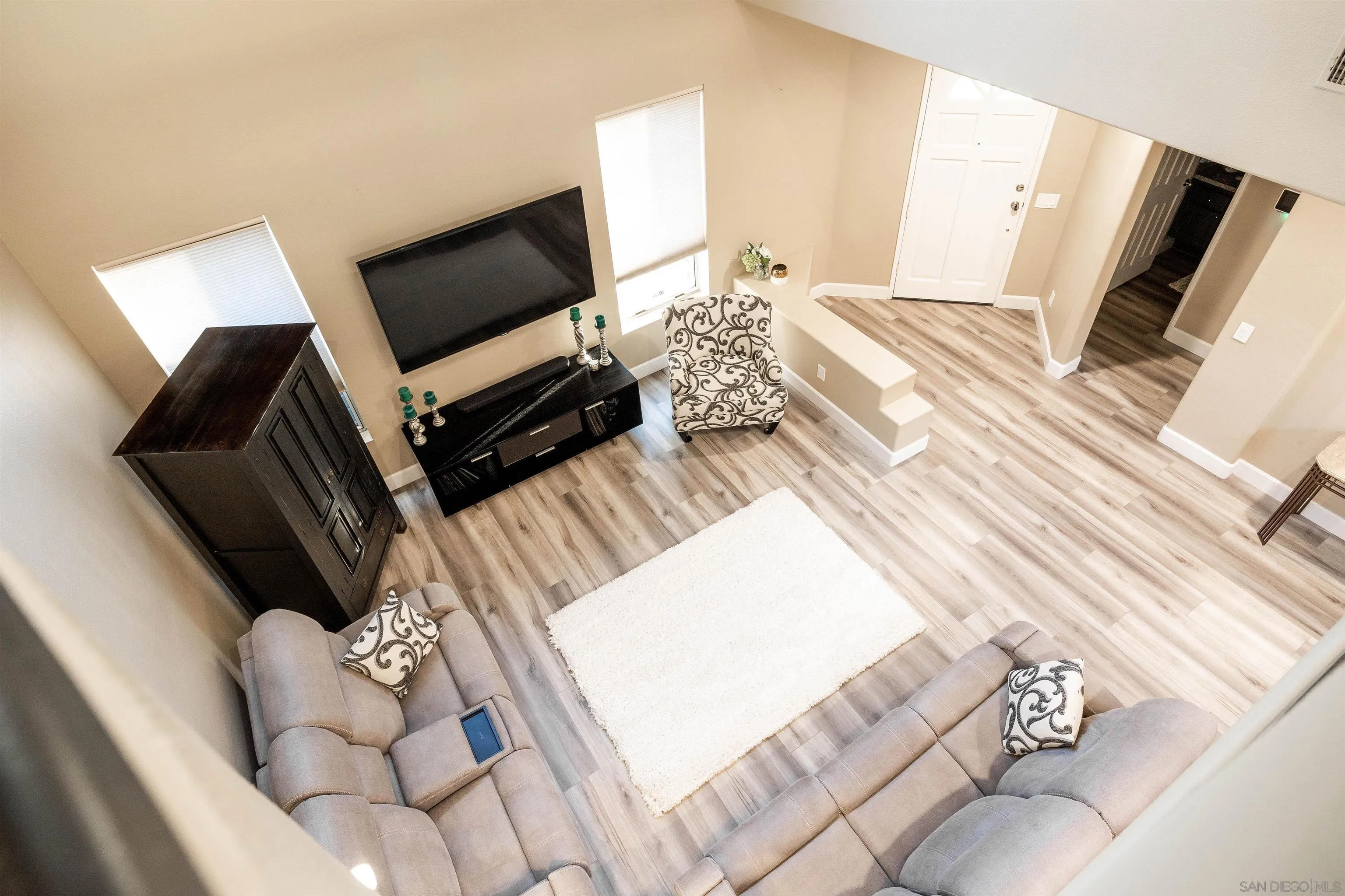 13835 Carmel Ridge Road San Diego, CA 92128 - Photo 6 of 38 a bedroom with a bed and flat screen tv