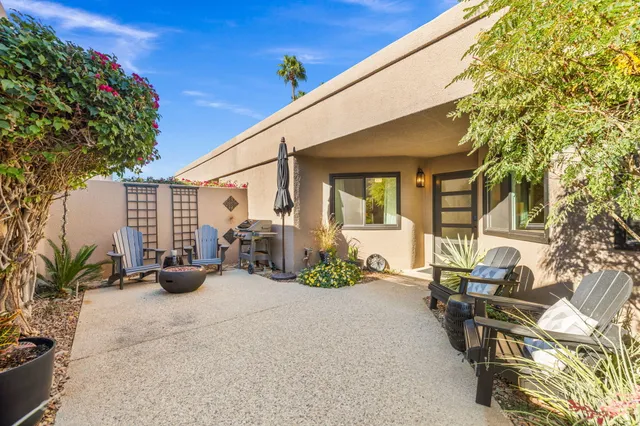 a bathroom with a toilet a sink and shower