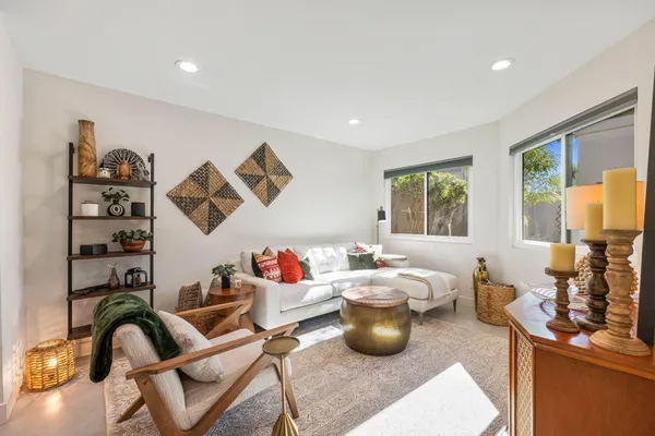 a kitchen with a sink refrigerator and microwave