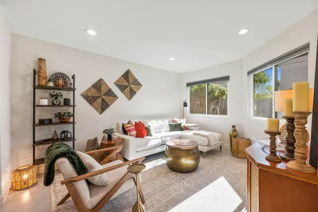 a kitchen with a refrigerator and a stove