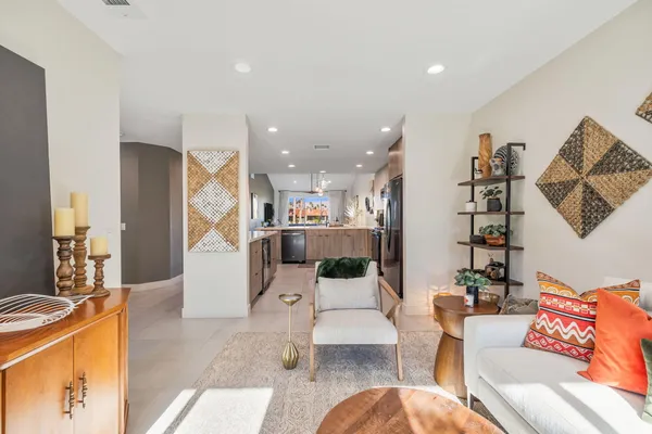 a kitchen with a refrigerator and a stove