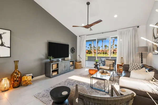 a bathroom with a shower and a glass door