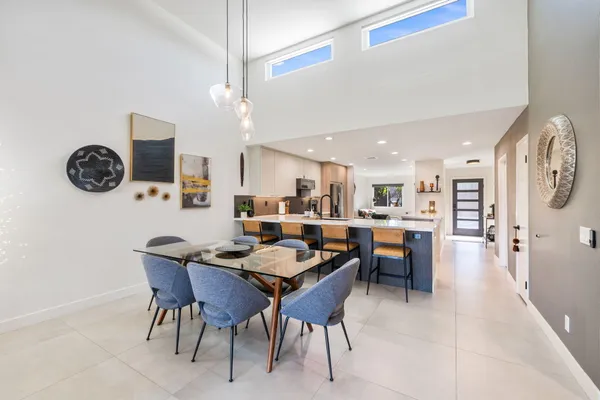 a bathroom with a shower and a sink