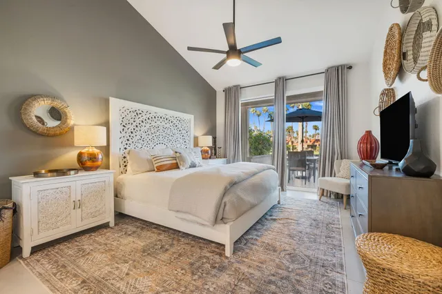 a patio with a patio table and chairs