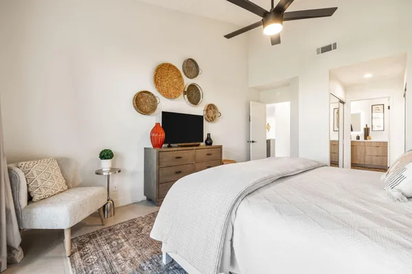 a patio with a patio table and chairs