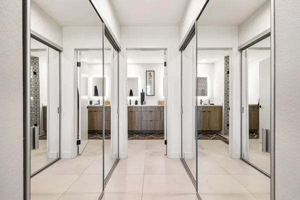 a view of a chairs and table in patio