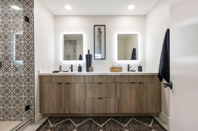 a view of a city with mountains in the background