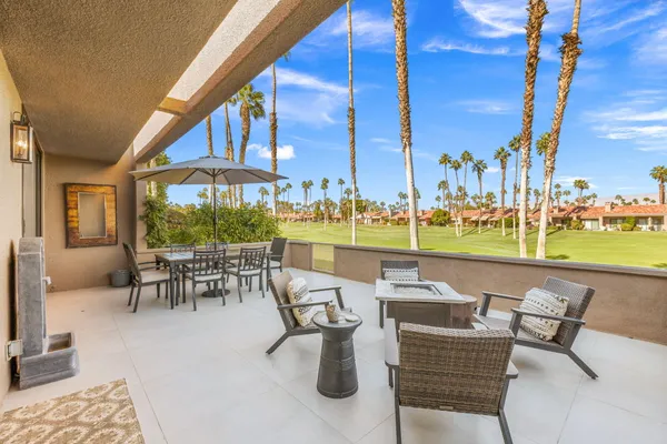 a view of a city with mountains in the background