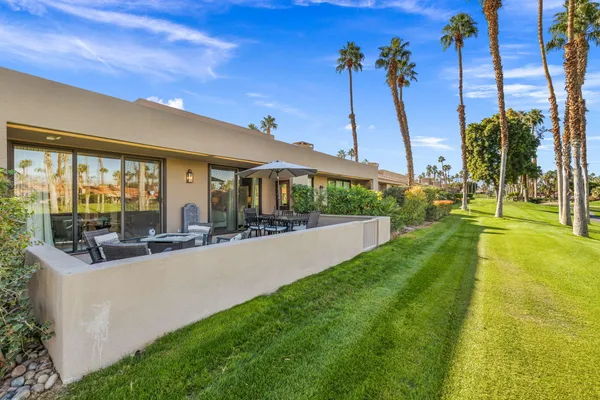 a view of swimming pool with a garden and stairs