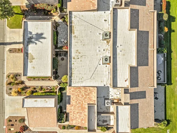 a view of a outdoor space in front of a house