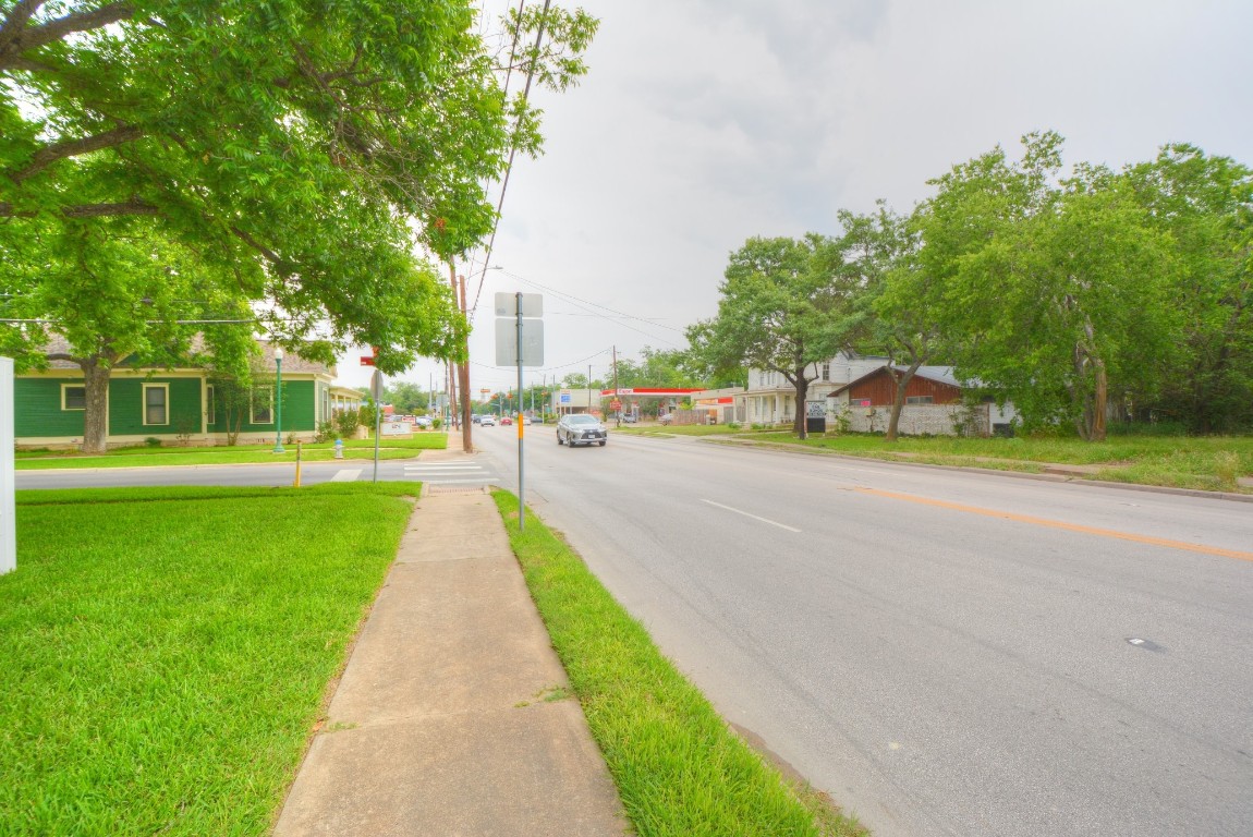 302 West University Avenue Georgetown, TX 78626 - Photo 5 of 7 a view of park with plants and large trees