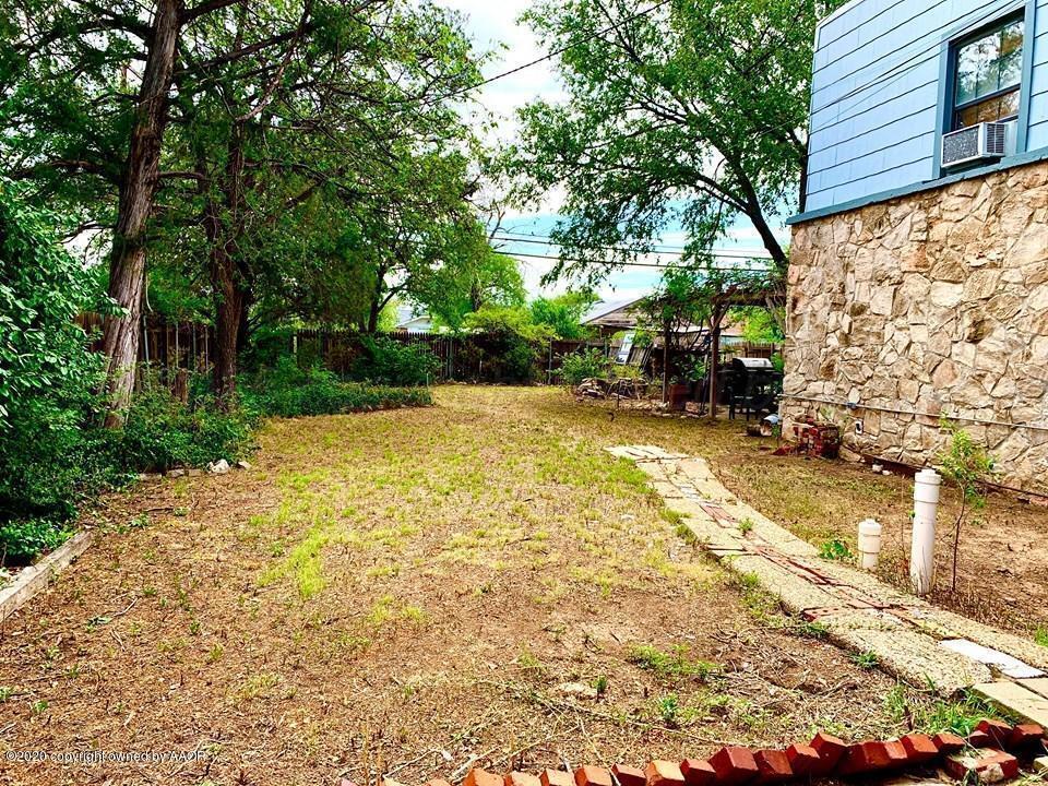 3701 South Van Buren Street Amarillo, TX 79110 - Photo 21 of 27 a view of backyard with swimming pool and sitting area