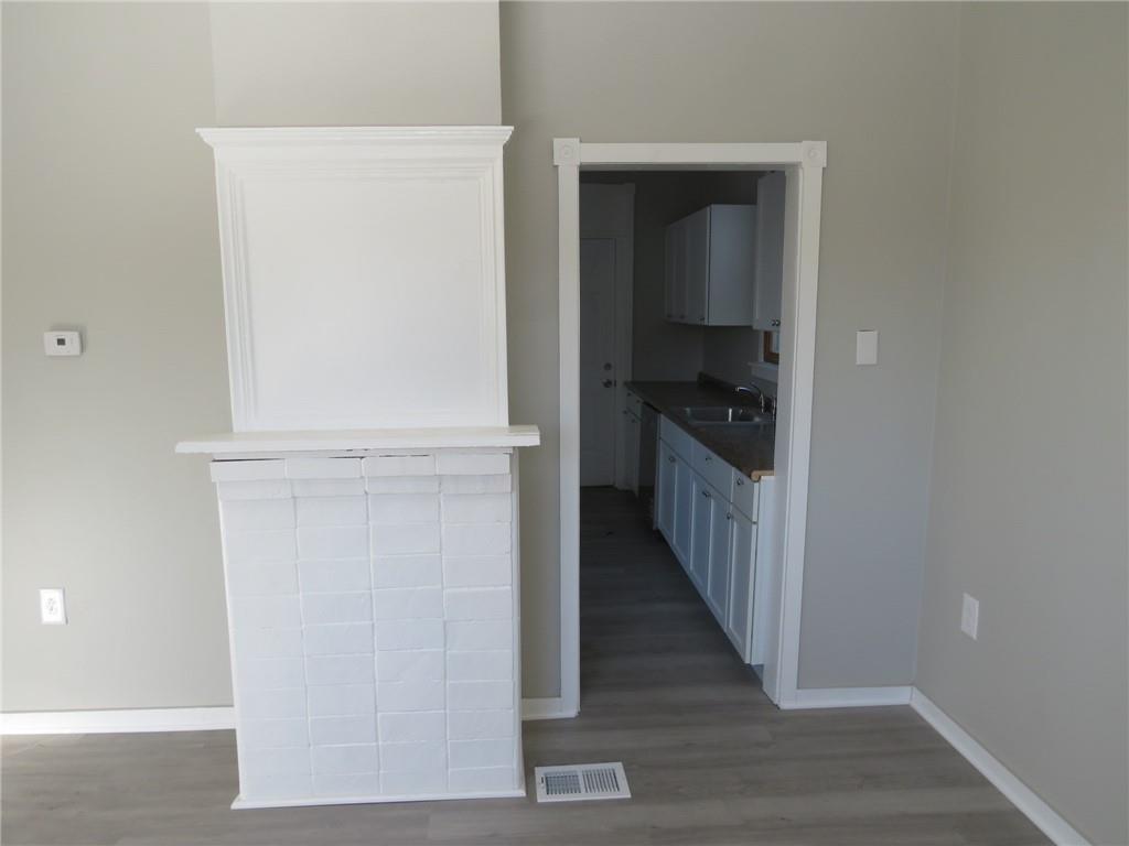 301 Paur Street Pittsburgh, PA 15211 - Photo 17 of 19 a hallway with wooden floor
