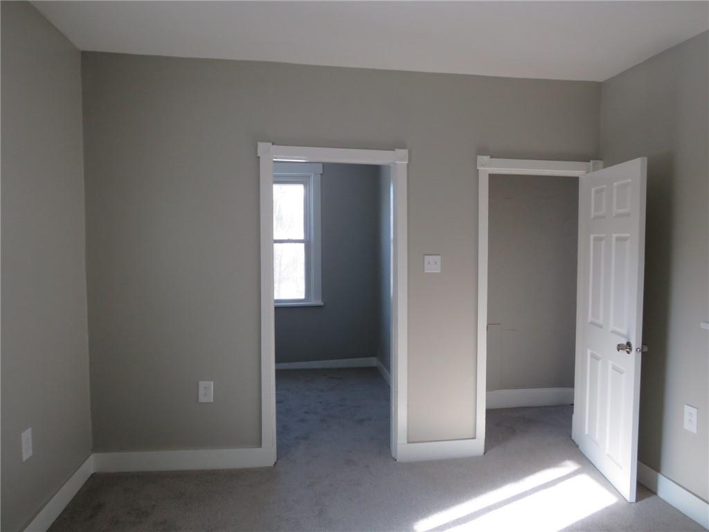301 Paur Street Pittsburgh, PA 15211 - Photo 5 of 19 an empty room with windows