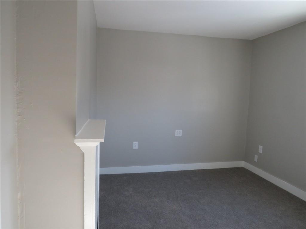 301 Paur Street Pittsburgh, PA 15211 - Photo 7 of 19 a room that has a window