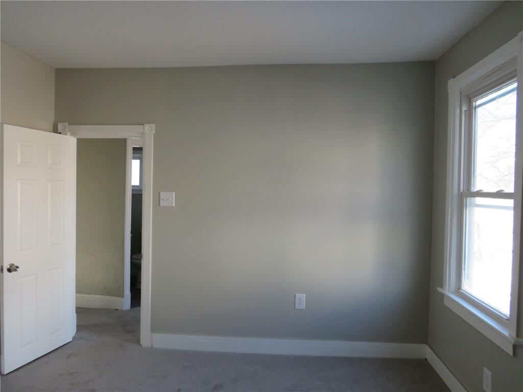 301 Paur Street Pittsburgh, PA 15211 - Photo 9 of 19 an empty room with windows and closet