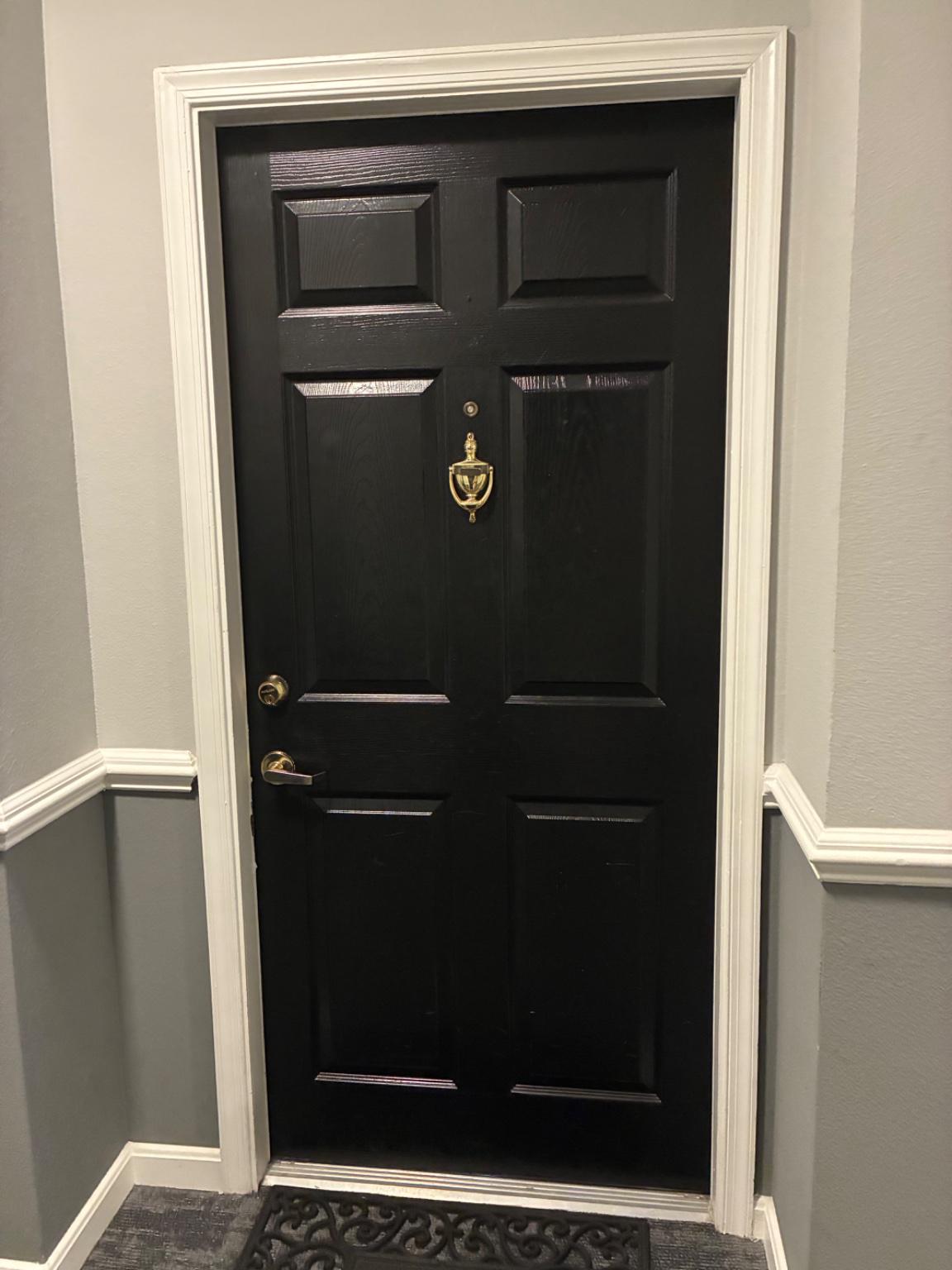 1571 Spring Gate Dr., Unit 6206 McLean, VA 22102 - Photo 25 of 26 Elegant black entry door with classic charm