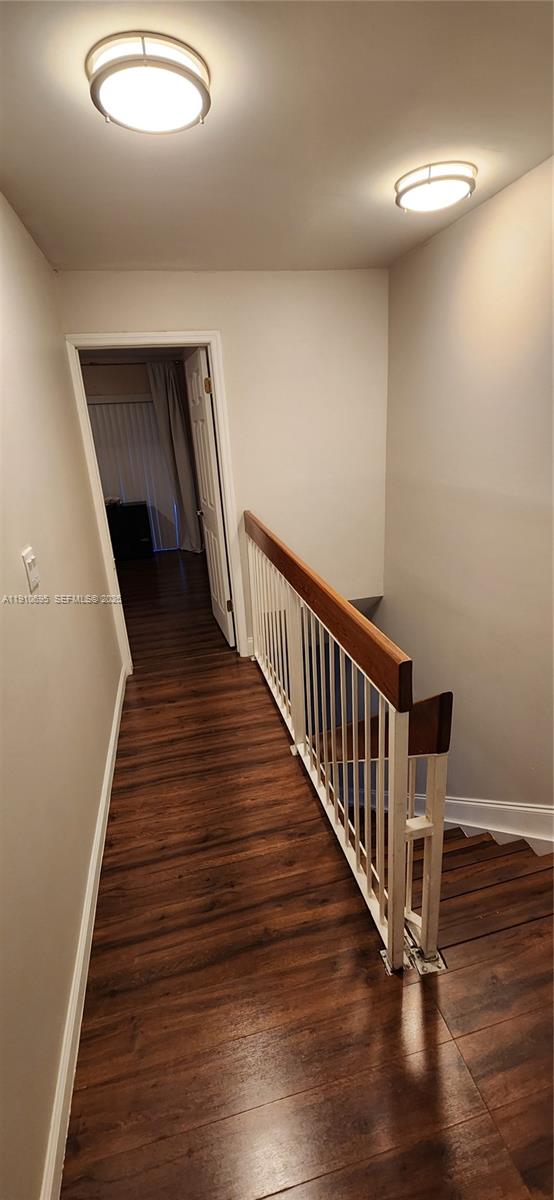 6250 Southwest 130th Avenue, Unit 703 Miami, FL 33183 - Photo 12 of 29 a view of entryway and hall with wooden floor