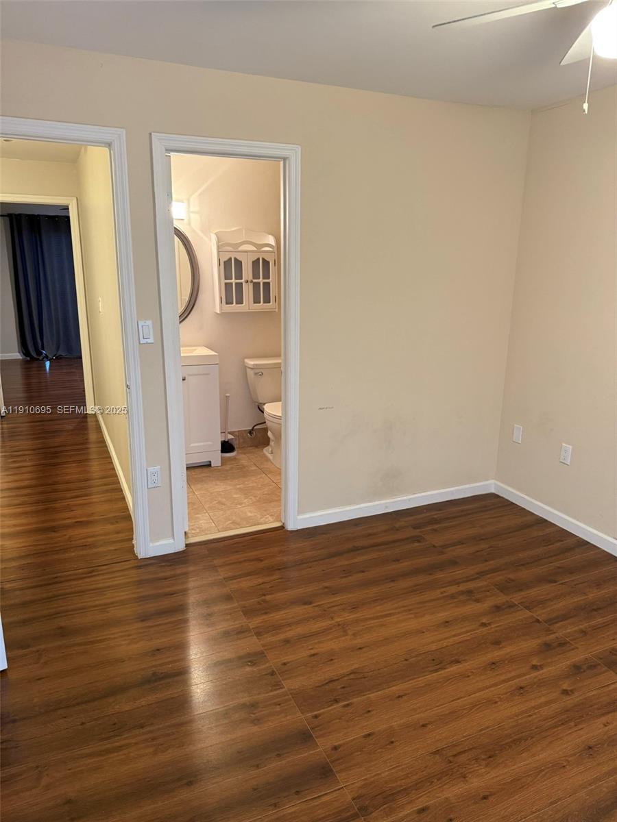 6250 Southwest 130th Avenue, Unit 703 Miami, FL 33183 - Photo 22 of 29 a view of a room with wooden floor