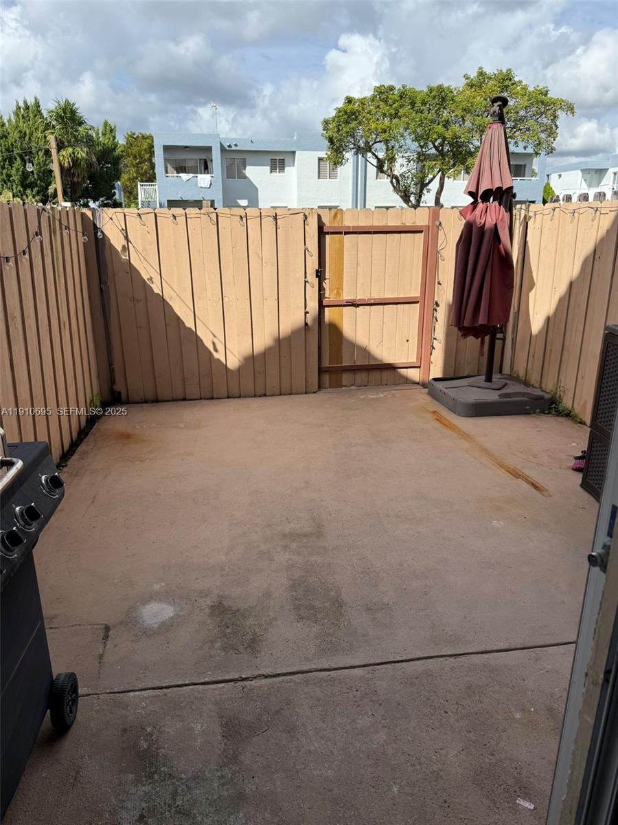 6250 Southwest 130th Avenue, Unit 703 Miami, FL 33183 - Photo 25 of 29 a view of a backyard