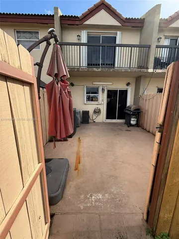 a view of a livingroom with a furniture