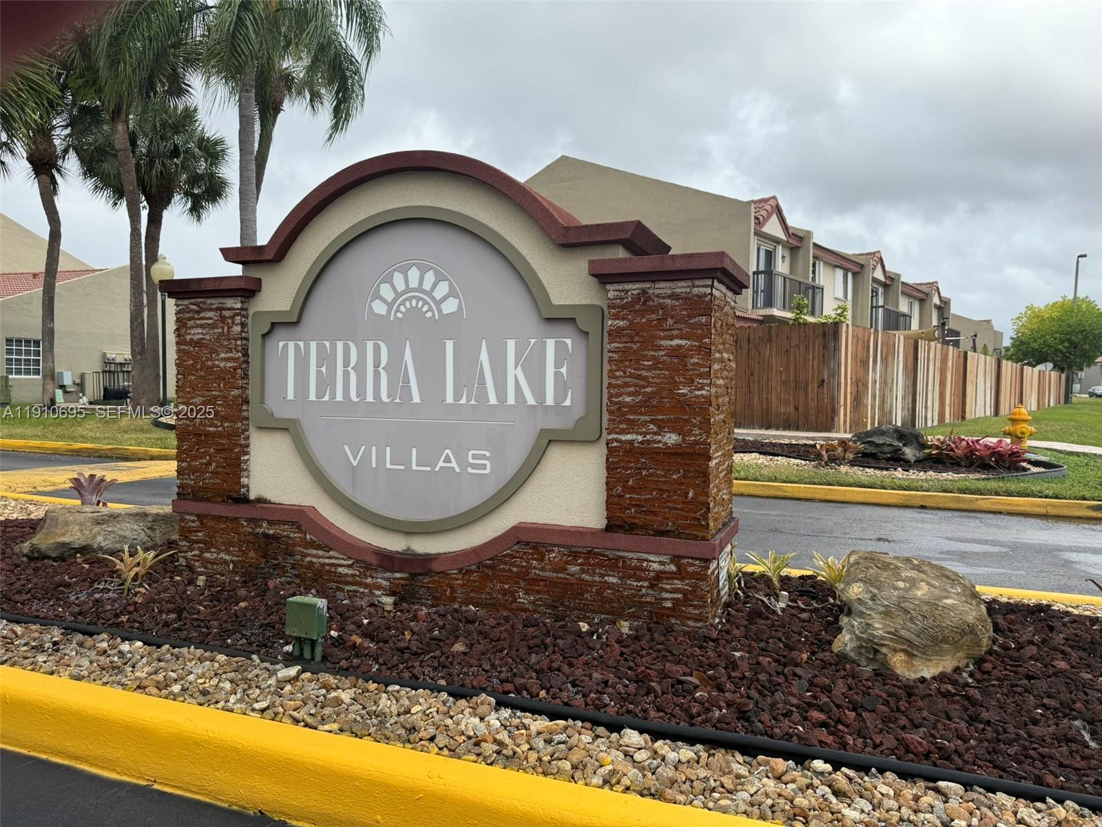 6250 Southwest 130th Avenue, Unit 703 Miami, FL 33183 - Photo 29 of 29 a view of a house with a swimming pool