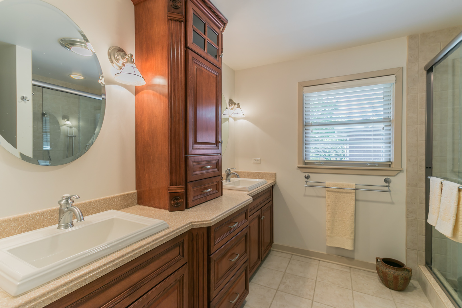 919 Meadows Road Geneva, IL 60134 - Photo 18 of 25 a bathroom with a sink a vanity and a mirror