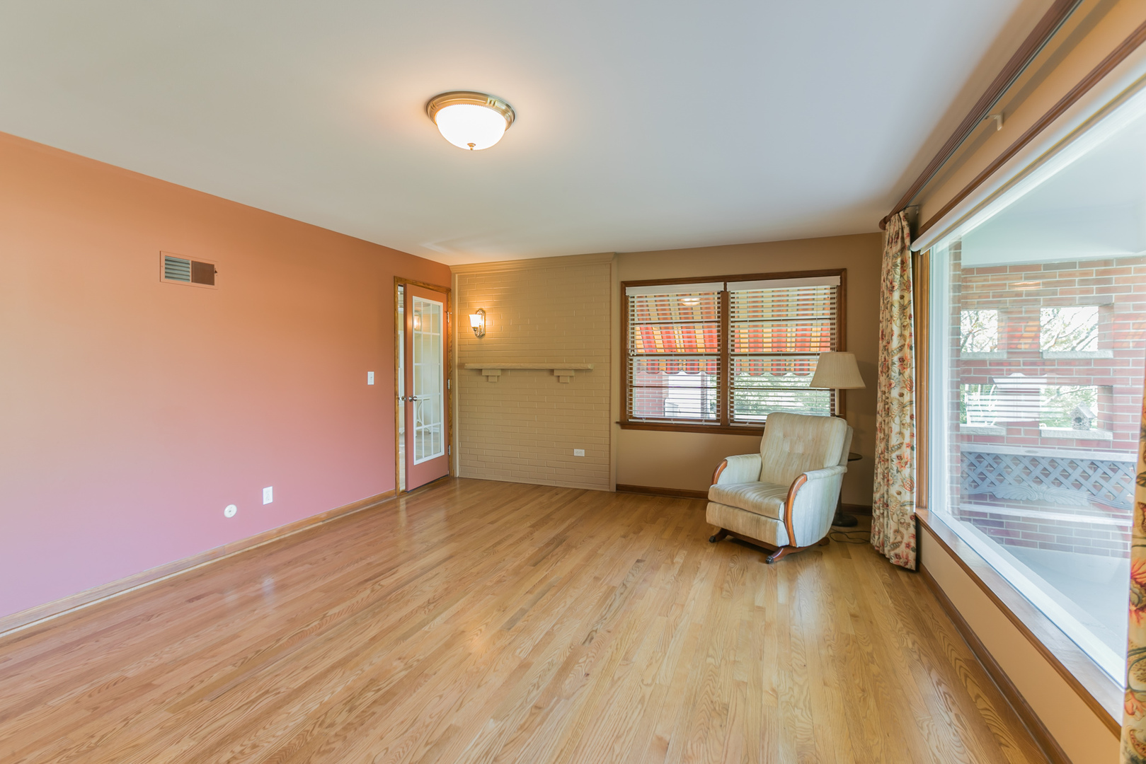 919 Meadows Road Geneva, IL 60134 - Photo 3 of 25 a view of an empty room and window