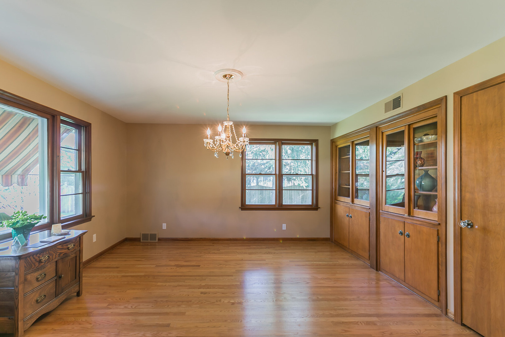 919 Meadows Road Geneva, IL 60134 - Photo 6 of 25 a view of an empty room with a window