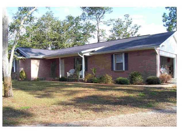 1570 Indian Woman Road Santa Rosa Beach, FL 32459 - Photo 3 of 11 a view front of house with yard