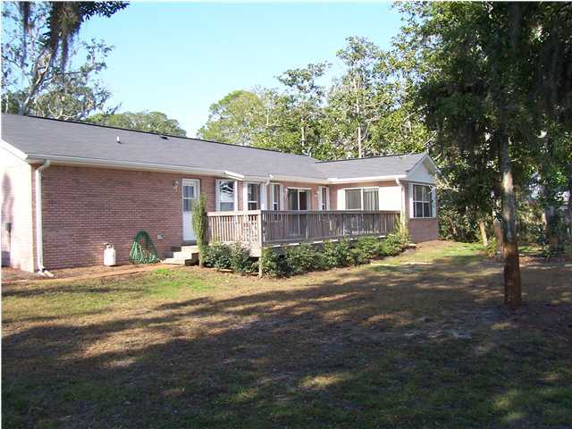 1570 Indian Woman Road Santa Rosa Beach, FL 32459 - Photo 10 of 11 a view of a house with a yard