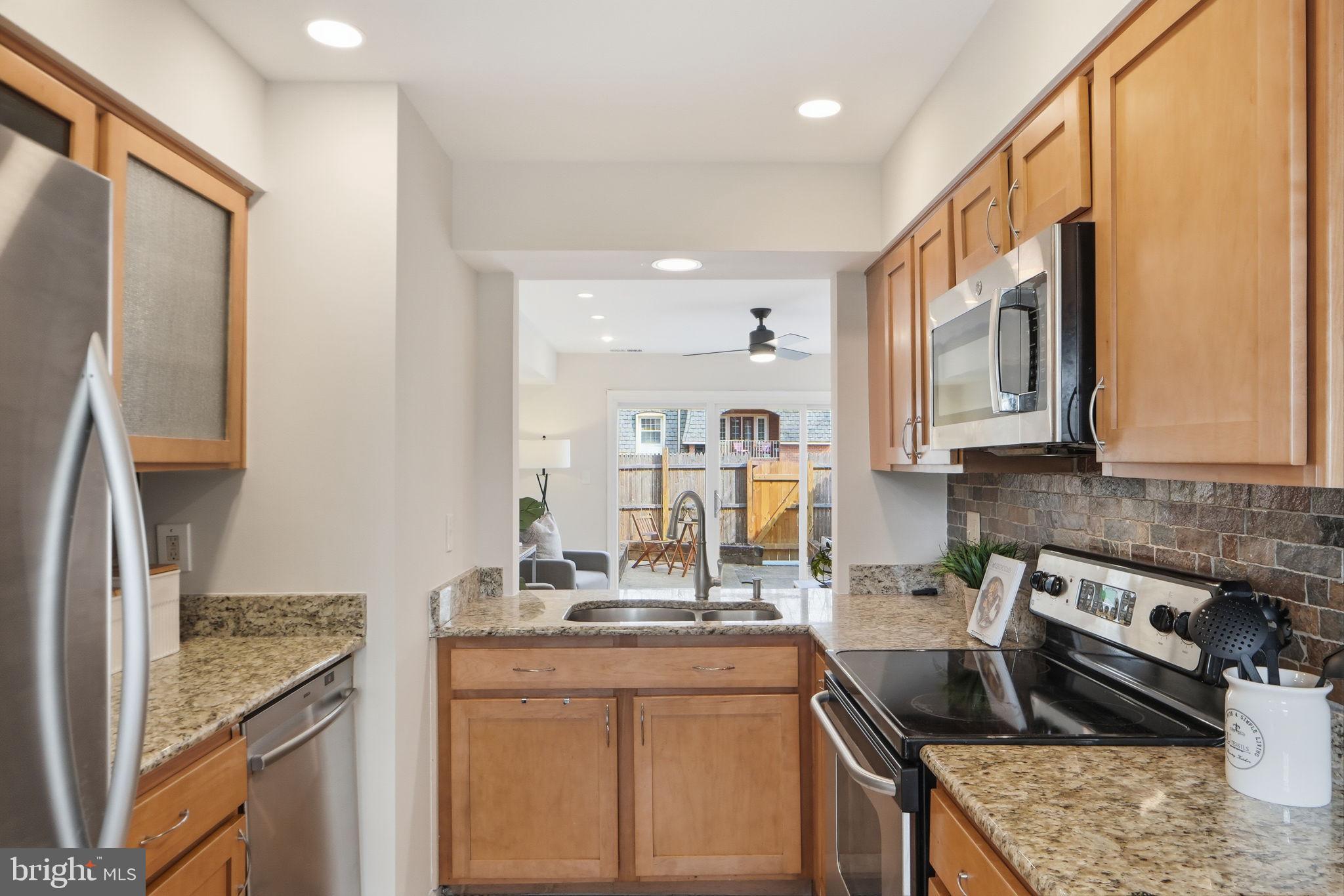 8230 Carrleigh Parkway, Unit 84 Springfield, VA 22152 - Photo 8 of 24 Modern kitchen with sleek finishes.