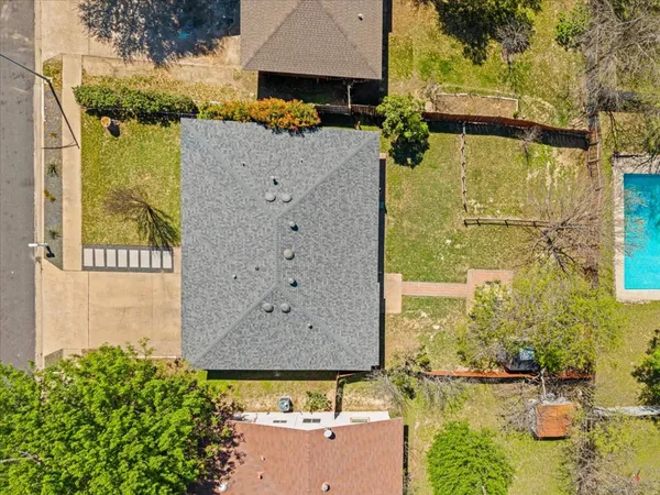 a picture of a bench in front of a building