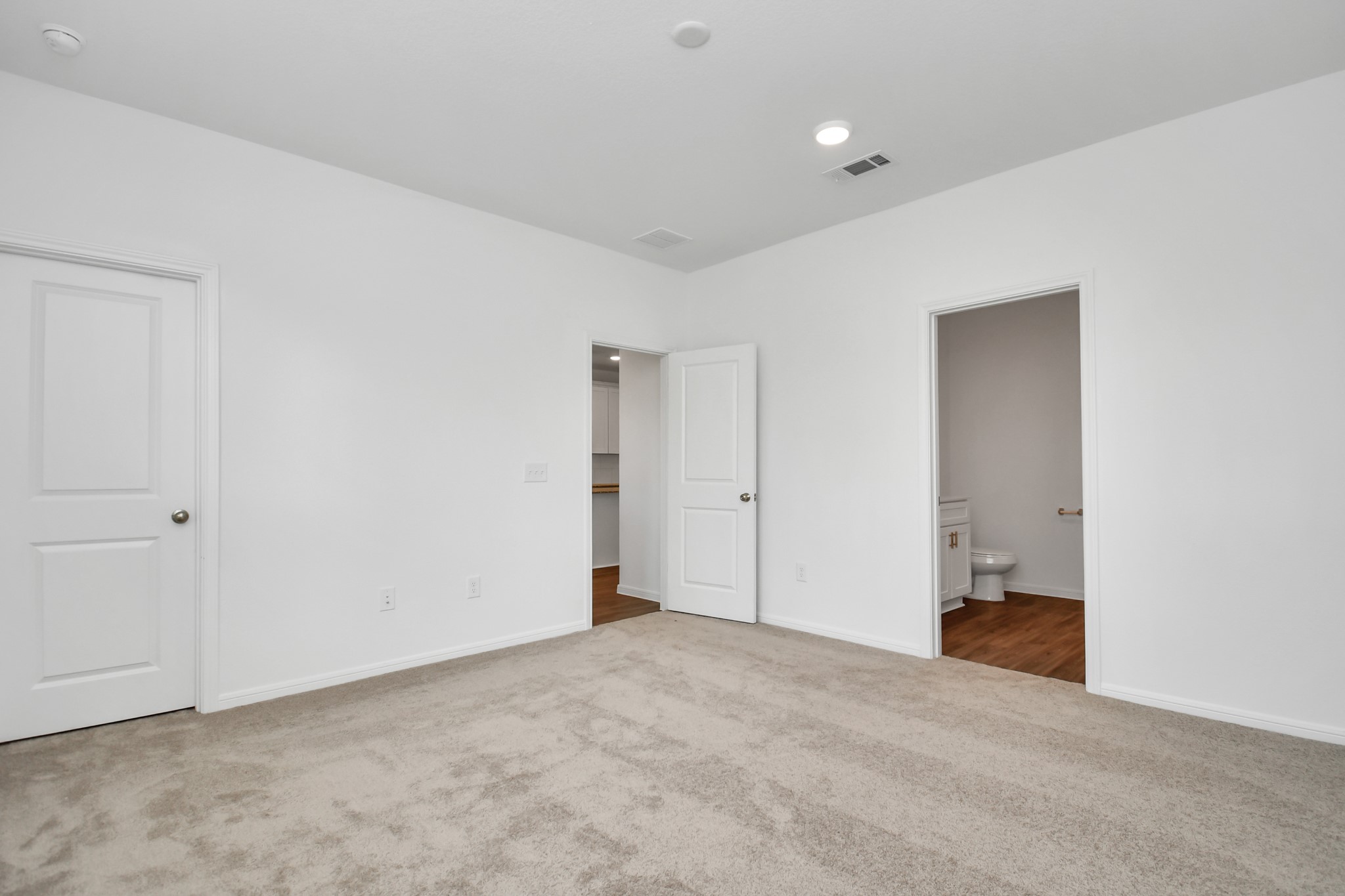 16150 Elbridge Court Conroe, TX 77302 - Photo 13 of 46 Another view of the Master Suite with with view of the bathroom.