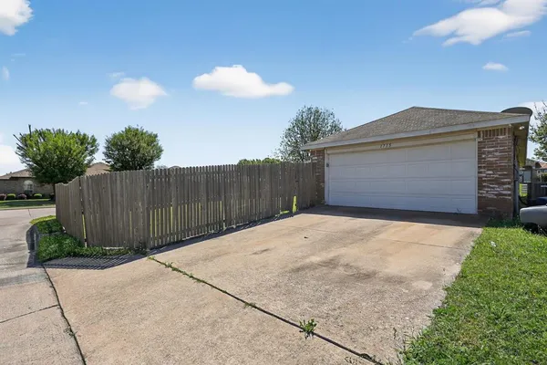 a front view of a house having yard