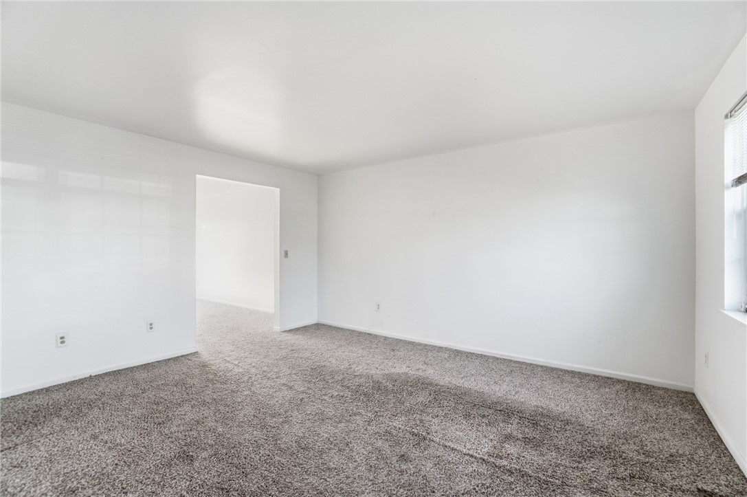 5414 Lamme Road Dayton, OH 45439 - Photo 8 of 32 This bright, carpeted room offers a versatile space, ready for your personal touch.
