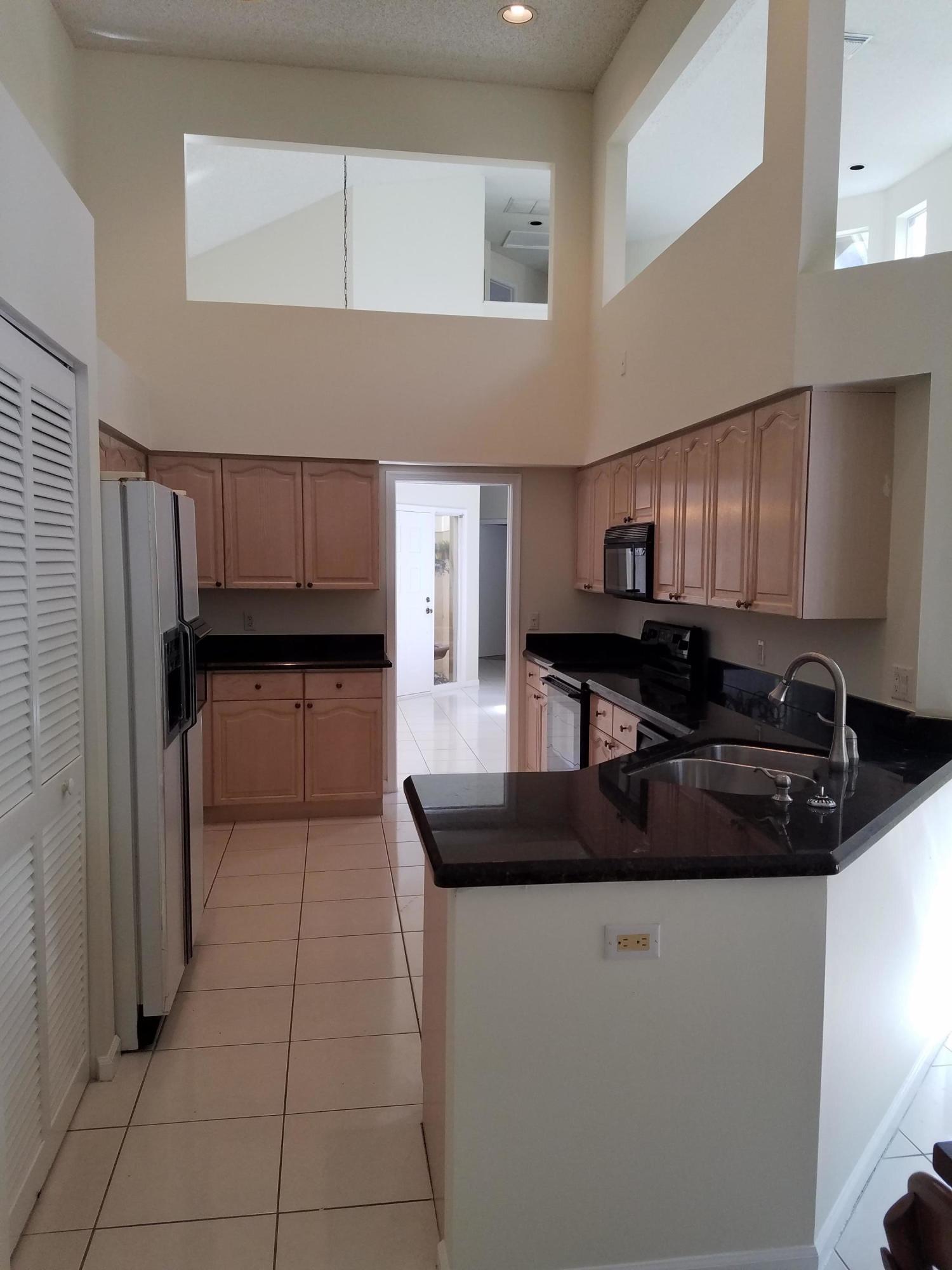 2490 Northwest 66th Drive Boca Raton, FL 33496 - Photo 8 of 22 Kitchen