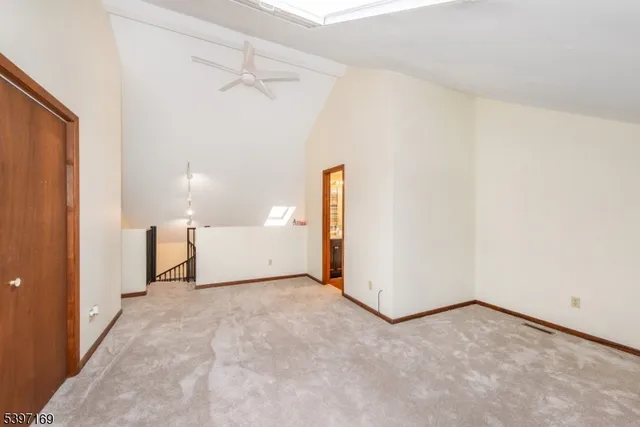 a kitchen with sink cabinets and wooden floor