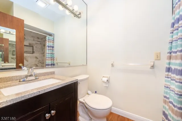 a view of a room with a hallway