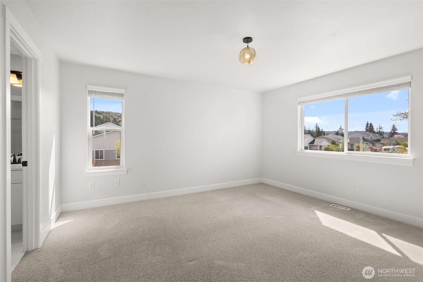 15696 Washington Street Sumner, WA 98390 - Photo 16 of 29 a view of an empty room with a window