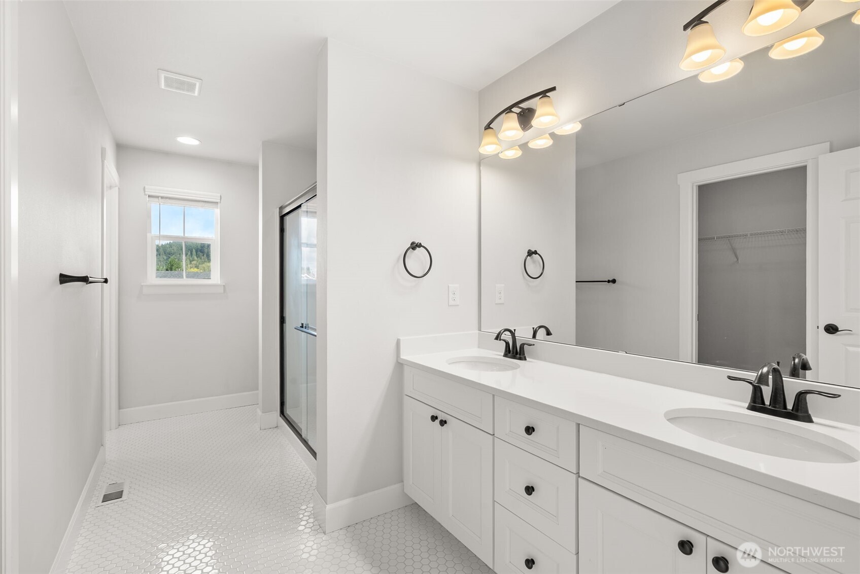 15696 Washington Street Sumner, WA 98390 - Photo 17 of 29 a bathroom with a double vanity sink mirror and shower