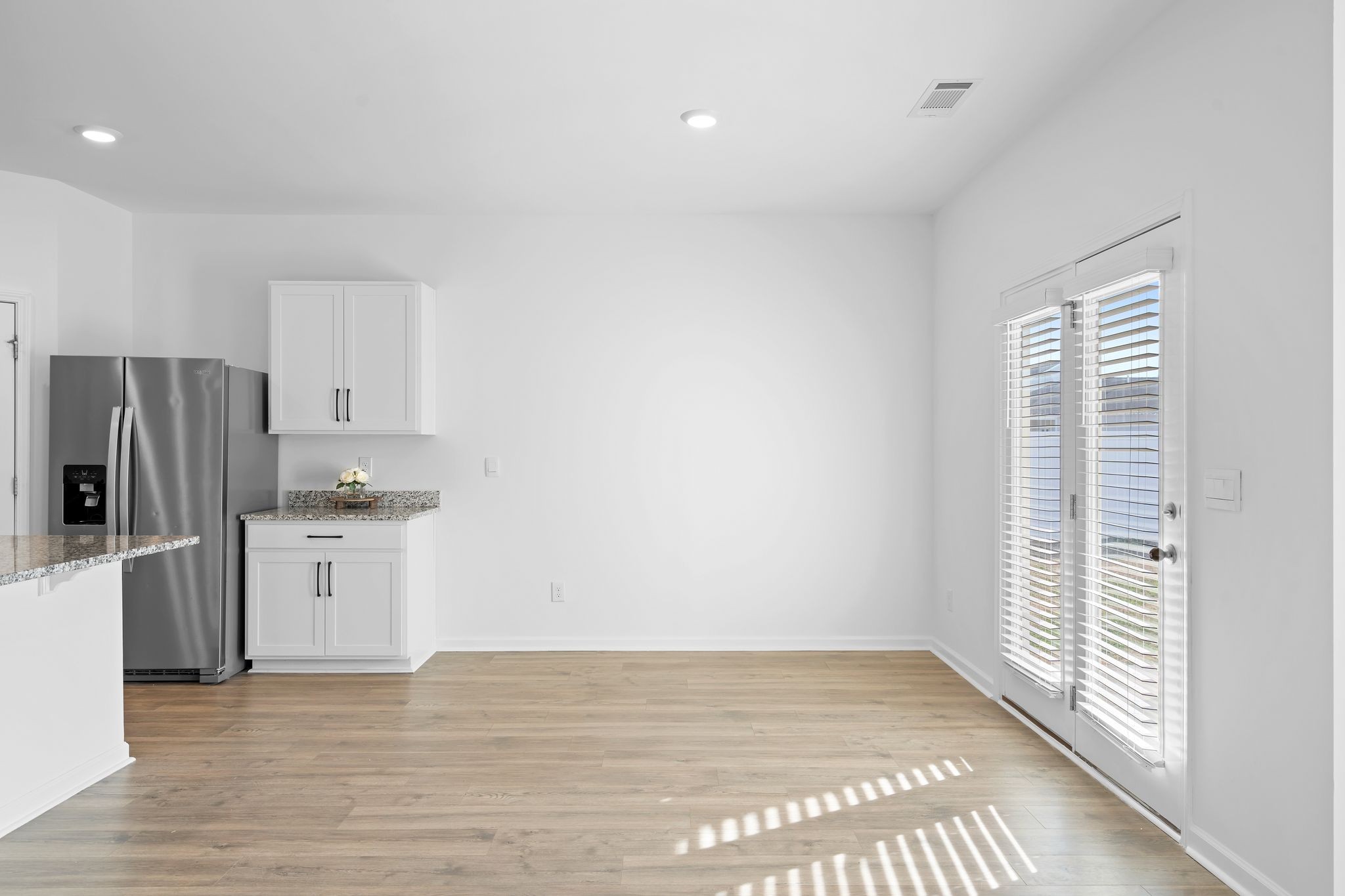 203 Welara Street Murfreesboro, TN 37129 - Photo 15 of 40 a view of a kitchen with a sink dishwasher and a refrigerator