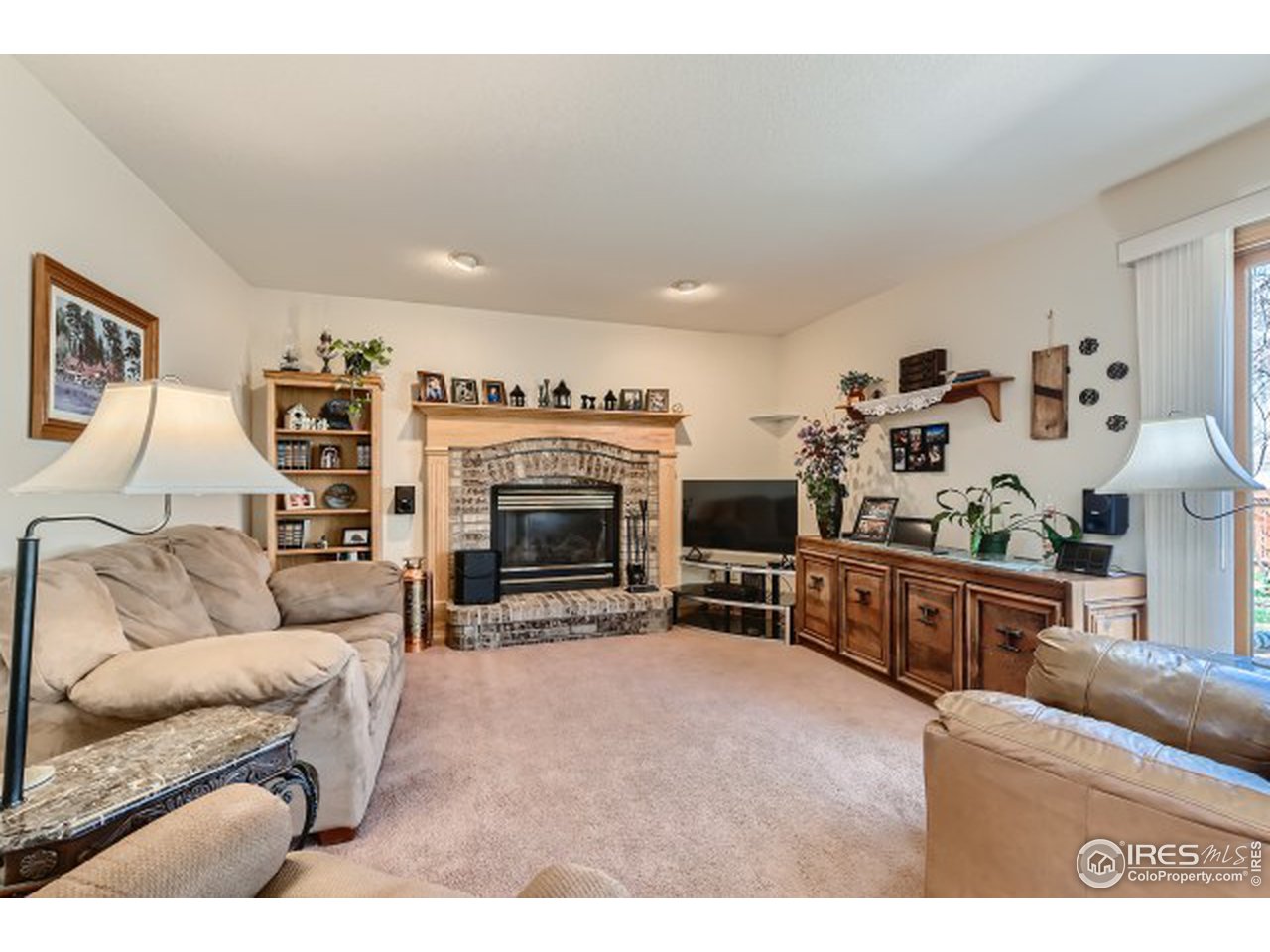 442 Flagler Road Fort Collins, CO 80525 - Photo 12 of 34 Gas FP in 2nd living room
