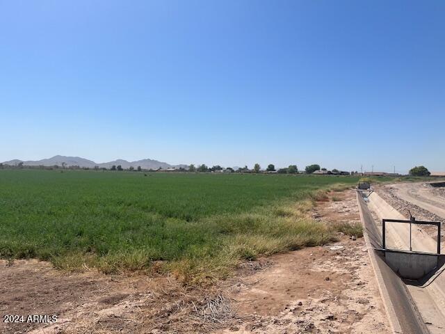 3 West Beloat Road Buckeye, AZ 85326 - Photo 3 of 9 a view of a lake with a mountain in the background