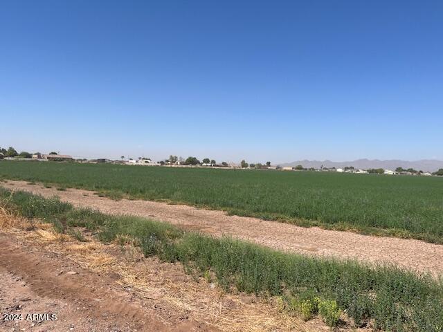 3 West Beloat Road Buckeye, AZ 85326 - Photo 6 of 9 a view of a lake with houses in the back