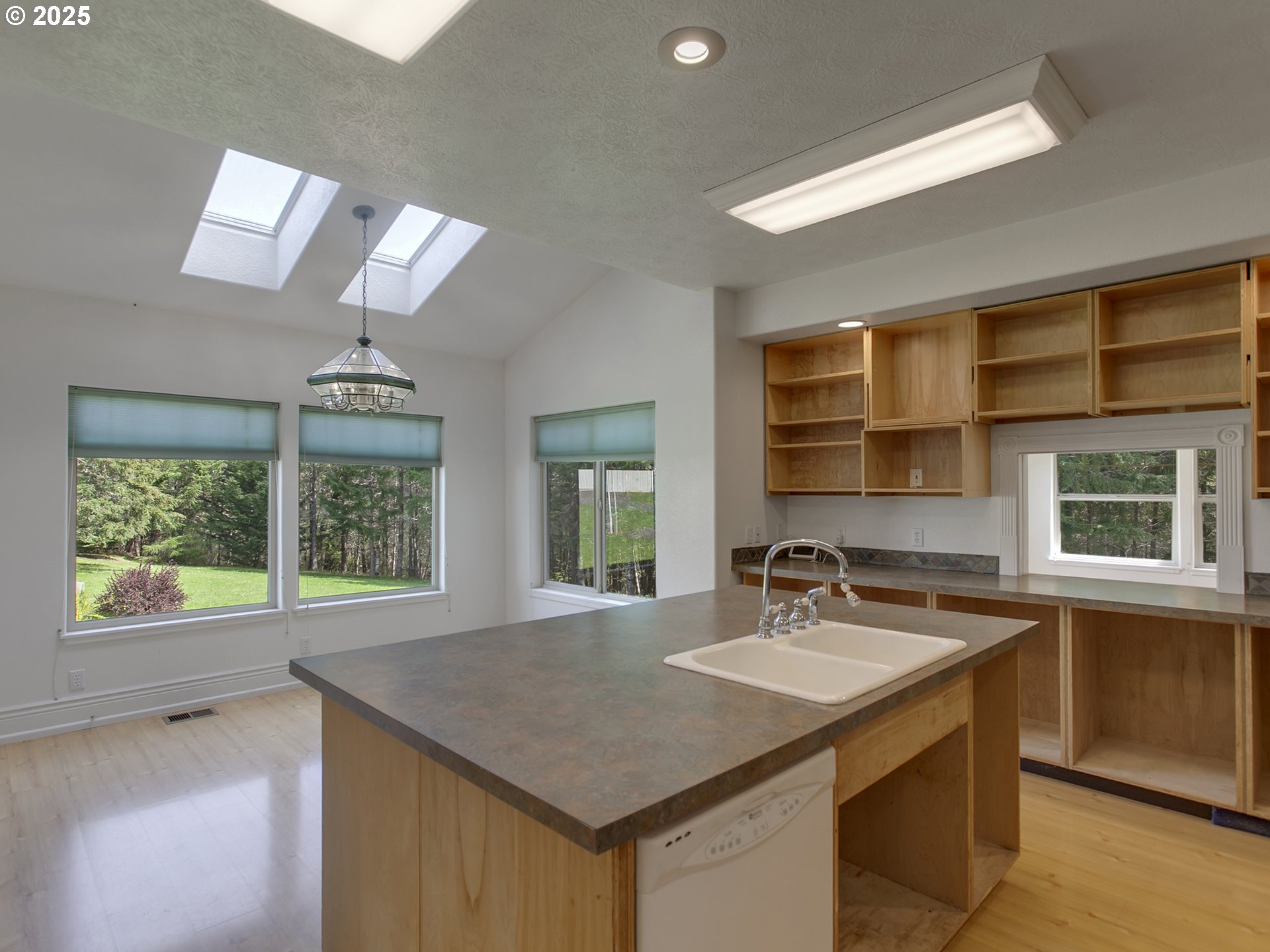 17234 Oakdale Road Dallas, OR 97338 - Photo 12 of 45 a kitchen with a sink and a window
